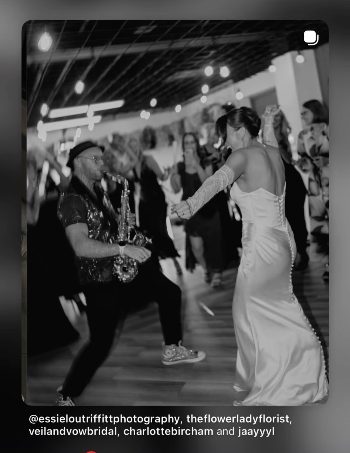Spencer playing sax alongside Charlotte on the dance floor at Whistle Barns